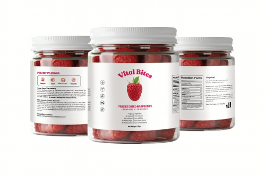 Three jars of Vital Bites freeze-dried raspberries on a white background
